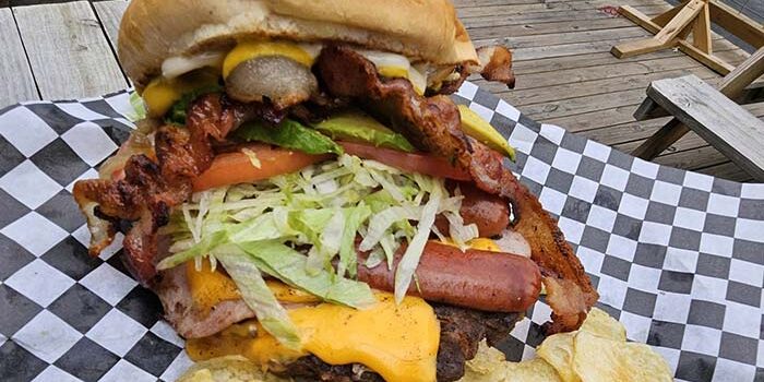 Tacos El Regio Texas Mexican Restaurant super bacon cheeseburger and potato chips